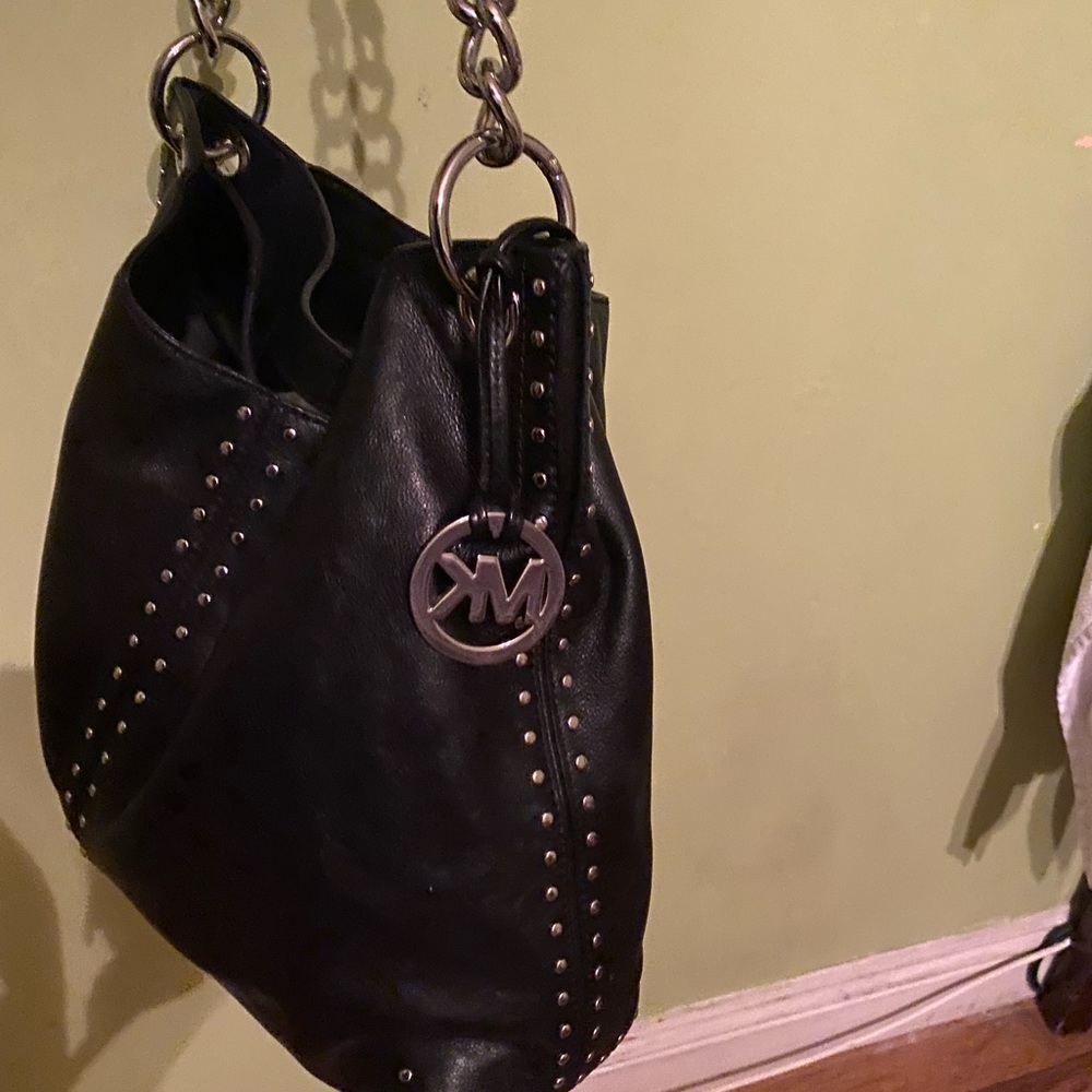 Black Leather Michael Kors purse, large purse , in good condition. Very clean.
